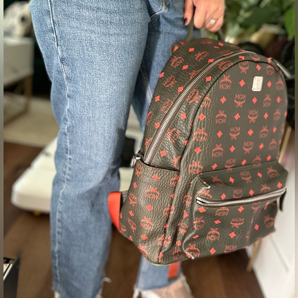 MCM Backpack – Black with Red/Orange Logo Print